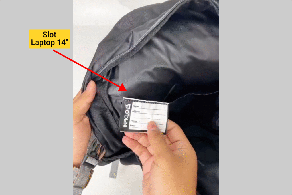 Slot laptop 14 inch di dalam kompartemen utama tas ransel kerja Inflico BA325IFS ditunjukkan tanda panah.